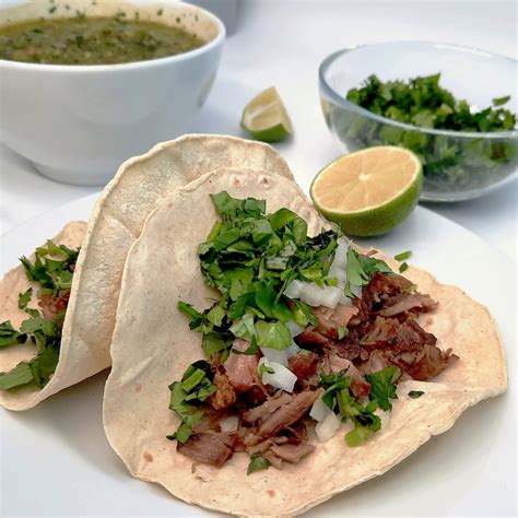 Tacos michoacan - Step 1. Make the carnitas: Melt lard in an 8-qt. saucepan over medium-high. Season pork with salt; cook, turning as needed, until browned, 10–12 minutes. Add milk, garlic, jalapeños and pickling liquid, onion, and lime and orange juices; boil. Reduce heat to medium-low; cook, covered, until pork is tender, about 2 hours.